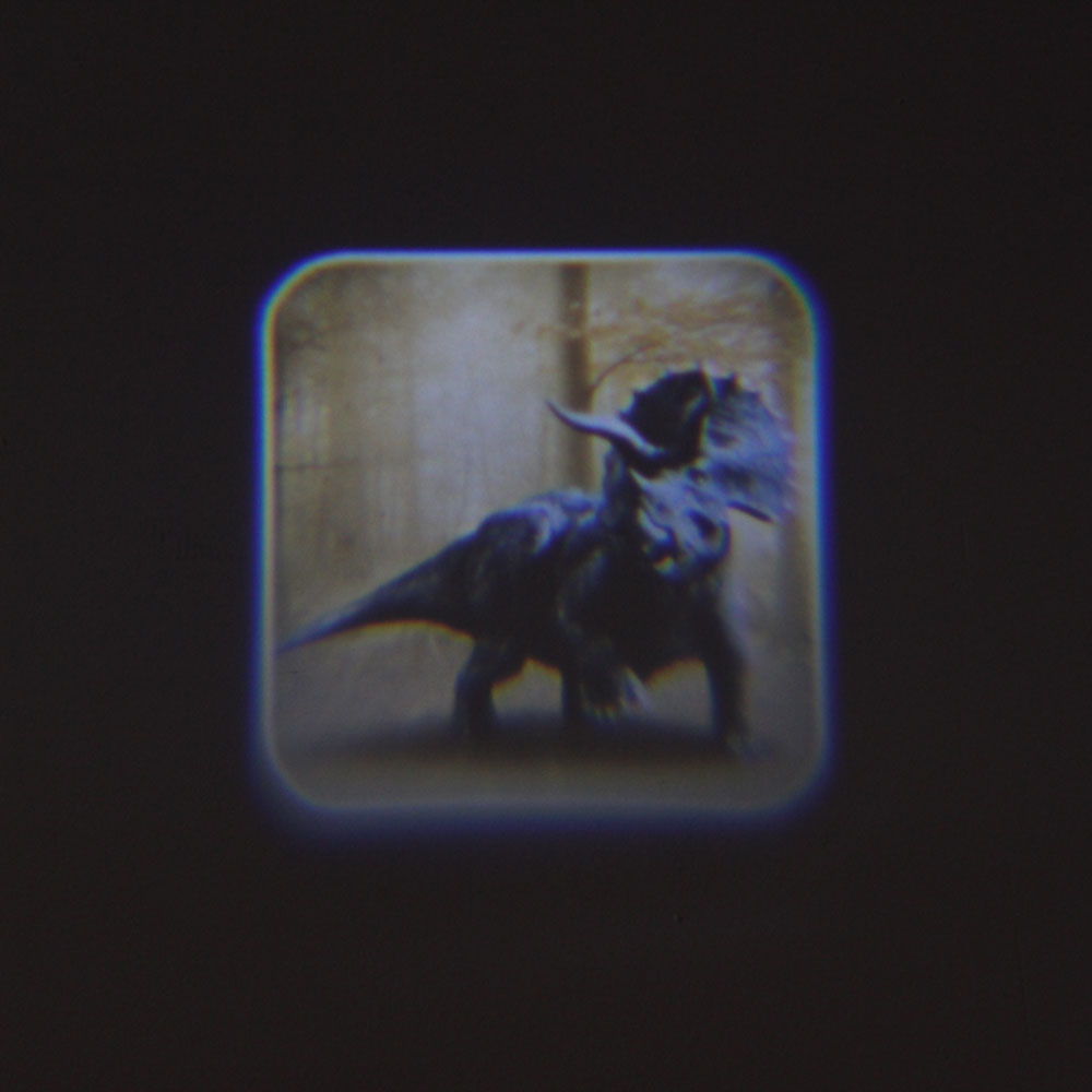 Đồ chơi đèn chiếu vẽ thế giới khủng long