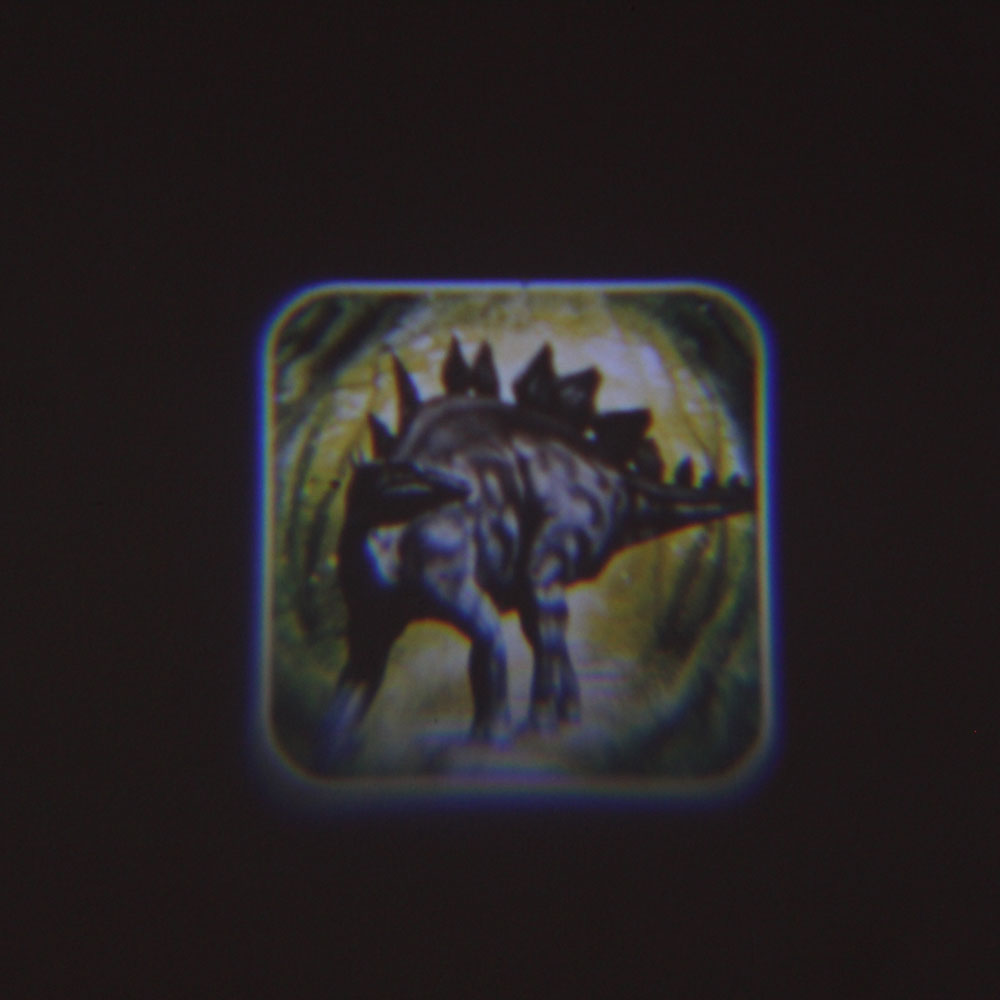 Đồ chơi đèn chiếu vẽ thế giới khủng long